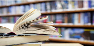 Library table with books