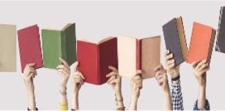 Hands holding up books