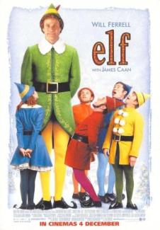 5 elves in colorful clothes look up to an oversized elf wearing green