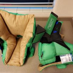 Pair of Green Padded "TruVue" Boots w/ Wedges. Found in Waterfalls employee break room.