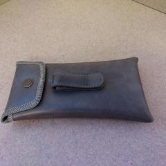 Black eye glasses case found in the Manor Library.