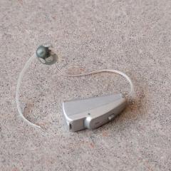 Silver Phonak Hearing Aid found on the floor near Manor Reception.