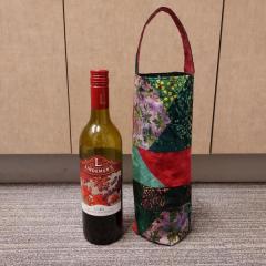 Wine Bottle in fabric wine bottle carrier.
