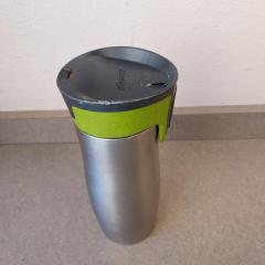 Silver and light green Contigo stainless steel water bottle.