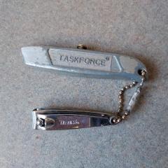 Silver metal pocket knife and fingernail clippers found in the Manor parking lot.