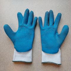 Blue and white gardening gloves found in front of the Manor on the bench.