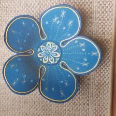 Blue flower shaped fabric bowl found in North Point.  Call Jen Murche #6590 if it's yours!