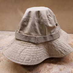 Swiss Tech khaki sunhat found on the Manor Reception counter.