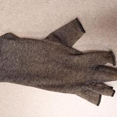 Grey fingerless cotton glove found in front of the Manor.