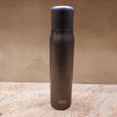 Water Bottle: Tall, dark grey metal by Built left in the Riverview dining room.