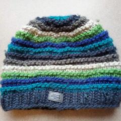 Hat: multi color winter beanie found in the Court Building.