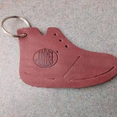 Leather shoe shaped key chain with "Loints of Holland" stamped on it.  Found at the Manor Reception Desk.