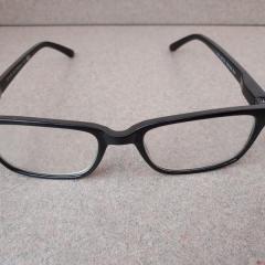 Black plastic +2.50 reading glasses found in the court building parking area.