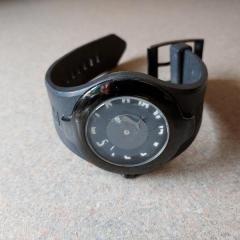Men's black Puma watch found near the loading dock.