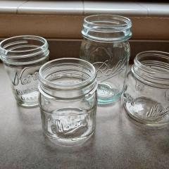 Set of 4 glass canning jars found at the pool.