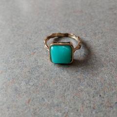 Gold ring with blue square stone found at the U Pick Roses near Waterfalls.