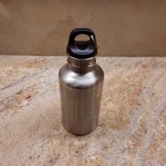 Small stainless steel water bottle by "Sub-Zero".
