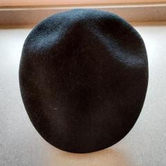 Black wool beret found in the Manor Library.