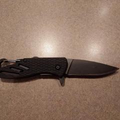 Black pocket knife left on a residents door and it's not theirs.