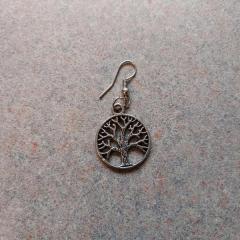 Round silver earring with tree found in the Terrace Auditorium.