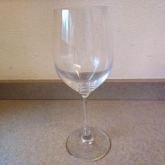 Clear wine glass found outside of the health center at the SW corner.