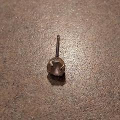Diamond stud earring found on the floor in the first floor bathroom near D wing.