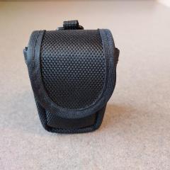 Film case found on a hallway chair facing the Triangle Garden.