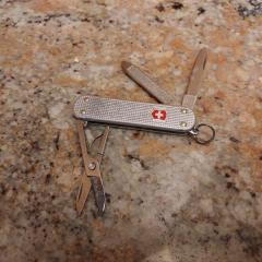 Small Swiss Army Knife found in the A wing/sky bridge towards garage.