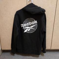 Black Reebok pullover hoodie found in the fitness cente