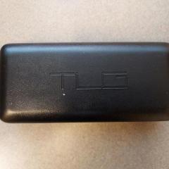 Black glasses case by TLG.