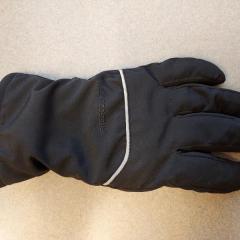 Single black winter glove by Free Country.