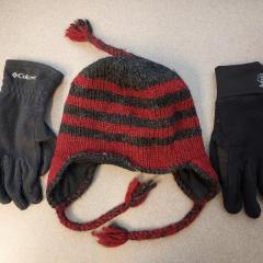 Red & Grey stripe wool hat and grey fleece gloves found on the Christmas Lights bus.