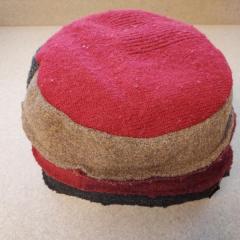 Multi color winter hat by baabaazuzu found in the Blue Heron Auditorium.