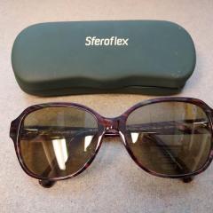Kirkland ladies sunglasses and dark green Sferoflex case found on the driveway in front of the Manor.