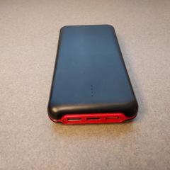 Black battery pack / charging block found in a Manor shopping cart.