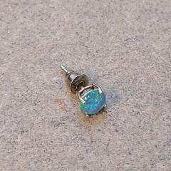 Light blue sparkle stud earring found on the 2nd floor, south wing of the Court Building.