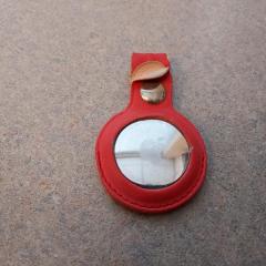 Red air tag left at the Court Salon.