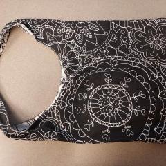 Reusable black and white floral bag found in Artworks.