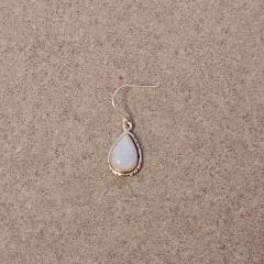 Silver teardrop opal earring found in the Terrace parking lot.