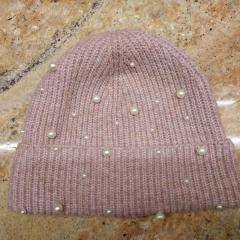 Pink winter hat with pearls found in the Blue Heron Auditorium.