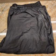 Mens black workout pants found in The Neigborhoods Reflection Room.