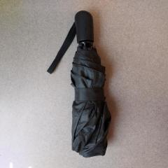 Small black automatic umbrella left on the #4 bus.