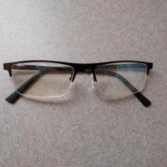 Men's black metal rimmed glasses found in the Court to Terrace corridor.