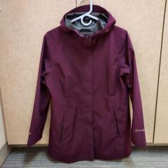 Womens burgundy rain coat by Eddie Bauer found in the Manor Library.