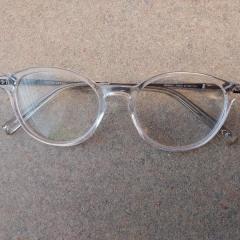 Clear Foster Grant reading glasses found in the Court Gallery.