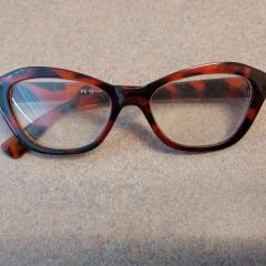 Tortoise shell colored cat eye reading glasses found outside the Manor.