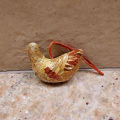 Wooden chicken ornament found outside the Manor building.