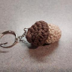 Crotched acorn keychain found on the floor in the hallway between Manor & Riverview.