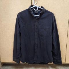 Men's black oxford shirt left in the Blue Heron Auditorium.
