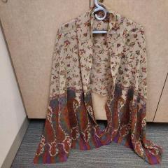Large lightweight multi color shawl / scarf left at the Manor puzzle table.